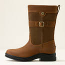 Brown leather mid-calf boot with buckle strap detail and visible stitching. The design is sleek, conveying a sense of rugged style and durability.