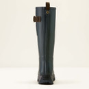 A tall, dark navy rubber boot is shown from the back on a plain background. It features a brown strap and a pull tab at the top, conveying a sturdy, rugged design.