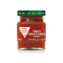 A jar of Cottage Delight Tomato, Garlic & Ginger Chutney with a red label and green lid, featuring the slogan "Here today, gone tomato."