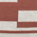 Close up of the nutmeg throw showing the geometric block pattern.