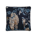 A square navy blue cushion with a floral pattern of beige and light blue wisteria flowers and foliage against a plain white background.