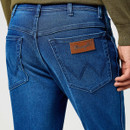 Wrangler straight leg blue jeans back pocket with stitched detailing and leather brand patch