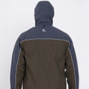 Person wearing a hooded jacket viewed from the back. The jacket is dark blue and olive with white piping and has a "K." logo on the upper back.