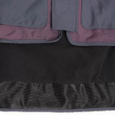 Close-up of a jacket hem showing two layers: a darknavy & purple outer, and a black fleece section. The texture looks warm and cozy.