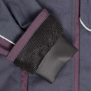 Close-up of a purple and navy jacket sleeve with a black mesh cuff and smooth fabric detail. The textures suggest durability and style.