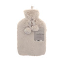 A grey hot water bottle with a soft faux fur cover, decorated with two ribbon-tied pom-poms for a cosy finish.