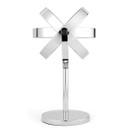 Futuristic silver metal sculpture with overlapping curved bands forming a symmetrical star-like design, mounted on a sleek cylindrical stand.