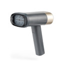 A modern, sleek handheld garment steamer with a gray body, gold accents, and a brush nozzle. It conveys a stylish and functional design.