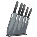 A sleek set of five silver knives with black handles in a transparent stand. The arrangement is neat, conveying a modern, organized tone.