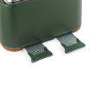 Close-up of a dark green toaster with two metal crumb trays partially extended. The toaster has wood accents, creating a modern and sleek design.