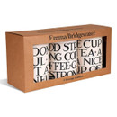 Trio of stylish cream tins with black typography, displayed in a branded cardboard sleeve.