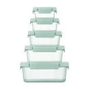 Five clear nesting containers with pastel green lids shown in descending sizes.