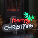 Illuminated Merry Christmas LED neon sign displayed on a mantelpiece, featuring festive red, white and green lighting for indoor seasonal decoration.