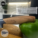 Close-up of Brooklyn Walnut soft-touch wood effect handle, highlighting ergonomic grip while cutting vegetables.