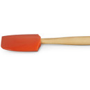 Side view of the Le Creuset Medium Spatula in Volcanic, highlighting the curved silicone head and natural wooden handle.