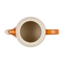 Top-down view of the Le Creuset Grand Teapot in Volcanic with lid removed, displaying the spacious cream-coloured interior and wide opening.