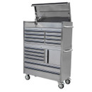 Stainless steel tool chest with multiple drawers and a top lid open, revealing storage space. It has side handles and wheels for mobility.