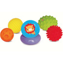 Colourful sensory balls of various textures are displayed. A blue ball with a cartoon lion, yellow and orange with ridges, green with bumps, and a red spiky ball.