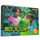 Two excited kids in lab coats play with pink slime and a green monster in a science kit labelled "Ooze 'N' Slime." The setting is a lab.