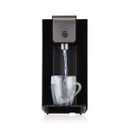 Sleek black water dispenser pouring water into a clear glass mug. The appliance features a modern design with stainless steel accents, conveying simplicity and elegance.