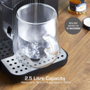 A glass mug is being filled with boiling water from a dispenser on a wooden worktop. Text reads "2.5 Litre Capacity" and "Boiling water in 10 seconds."