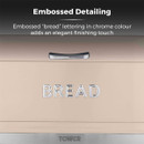 Embossed chrome "BREAD" letters on a beige surface under a silver handle. Text above highlights the elegant detailing of a bread box.