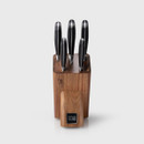 Front view of a five-piece knife set with black handles stored in a rectangular wooden knife block with a branded Taylor’s Eye Witness logo.