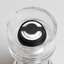 Close-up of the Tala pepper mill’s ceramic grinding mechanism showing white and black internal components with the Tala logo embossed on the adjuster.