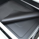 A close-up view of a drawer liner on a 26-inch 9-drawer tool cabinet on a white background