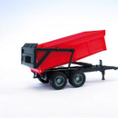 A view of a red tipper trailer toy on a white background