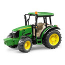 A view of a John Deere toy tractor on a white background