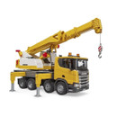 Toy yellow crane truck with an extended arm and hook, supported by four stabilizing legs. It has realistic details, evoking a sense of construction work.