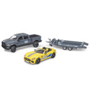 Toy vehicles set on white background, featuring a grey pickup truck, yellow convertible, and a grey car trailer. The scene is playful and detailed.