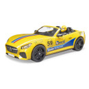 Yellow toy racing car with blue and red stripes, featuring a number 59 on the side. A driver in a yellow helmet is seated inside, creating a sporty vibe.