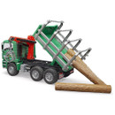 Toy logging truck with a green and red design unloading wooden logs. The truck bed is raised, and logs are positioned on the ground, emphasizing action.