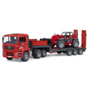 Red toy truck with trailer, hauling a red tractor. The truck has a detailed cab and four rear wheels, while the trailer has five wheels.