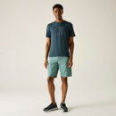 A front view of a man wearing a Regatta blue t-shirt  on a white background