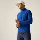 A front view of a man wearing a blue half zip Regatta fleece on a white background