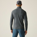 A back view of a man wearing a grey half zip Regatta fleece on a white background