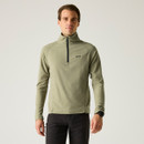 A front view of a man wearing a light sage Regatta fleece on a white background