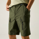 A close up view of a man wearing dark green Regatta walking shorts on a white background