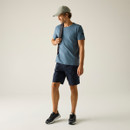 A front view of a man wearing navy Regatta walking shorts on a white background