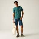 A front view of a green graphic Regatta t-shirt on a white background