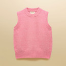 Flat-lay of a bright pink sleeveless knitted vest with ribbed trims, presented on a warm neutral background.