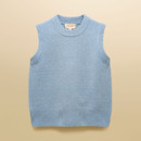 Flat lay of a women’s sky-blue sleeveless knitted vest with ribbed trims, displayed on a beige background.