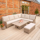 Spacious rattan corner lounge set with neutral cushions and a height-adjustable dining table on a light wood-effect deck.