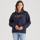 Front view of a woman wearing a navy blue pullover hoodie with drawstrings and “Ridgeline” logo text across the chest. The hoodie features a large front kangaroo pocket with a vertical zip detail. She pairs it with light blue jeans against a plain light grey background.