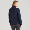 Back view of the navy high-neck top, showing the smooth finish, full-length sleeves and clean silhouette.