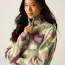 Close-up of Glacier Green Abstract Print half-zip fleece showing collar, zip and chest logo badge.