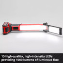 Portable LED work light with red and black casing emits bright light, showcasing its dual-panel design on a gray background. Text reads 1000 lumens.